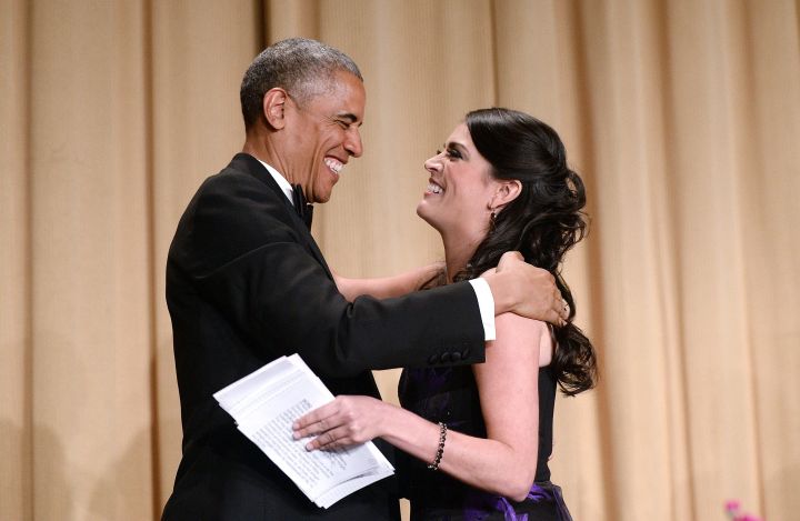 President Obama hugs host Cecily Strong