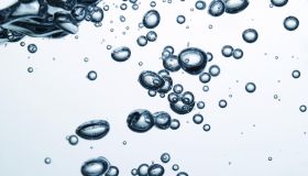 Bubbles in light blue water