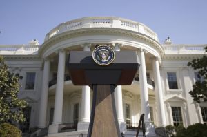 USA, Washington DC, Presidential Seal on podium in front of The White House, low angle view