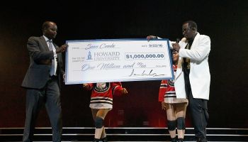 Sean 'Diddy' Combs Presents Howard University President Wayne A.I. Frederick With Special Donation Check