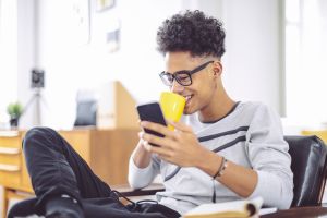 Young man working at home office