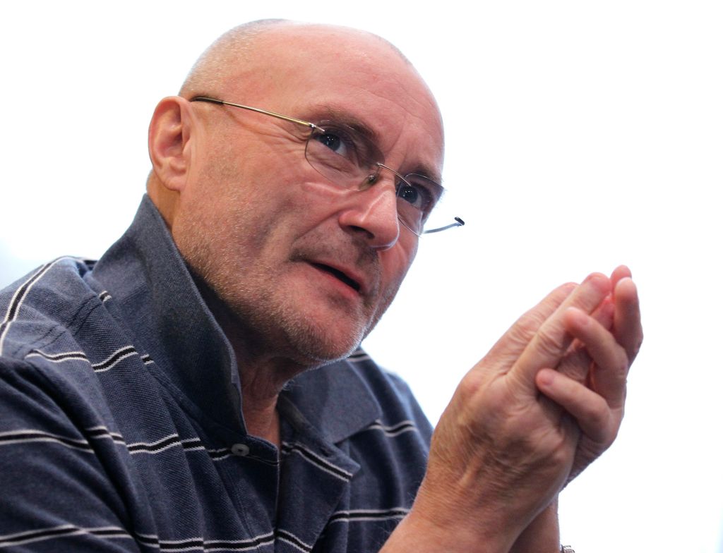 Phil Collins hospitalized after fall, postpones tour