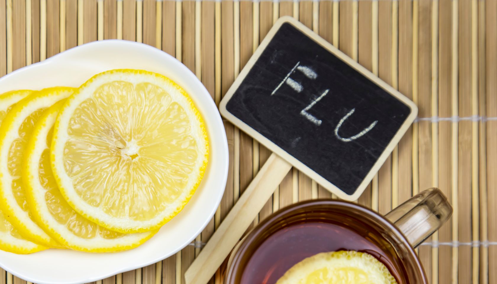 Hot tea, Capsules and pills and Digital medical thermometer. Medical concept