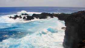 Impressive Easter Island and dramatic coastline shore: blue waves splashing on the rocks formation cliffs - Rapa Nui ancient civilization - Idyllic pacific ocean at dramatic sunset, dramatic landscape panorama – Chile