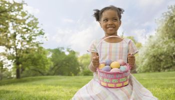 African girl holding Easter basket