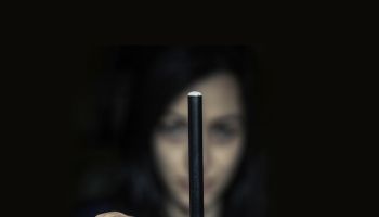 Woman holding an electronic cigarette