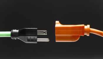 Male and female electrical plugs, close-up, side view