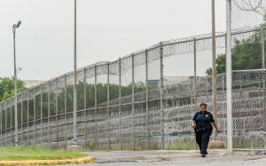 Stephen Moyer, Secretary of the Maryland Dept of Public Safety and Correctional Services, tours the Correctional Institution for Women with the warden, Margaret Chippendale.