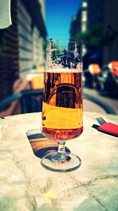 Close-Up Of Beer In Drinking Glass On Table In Sunny Day