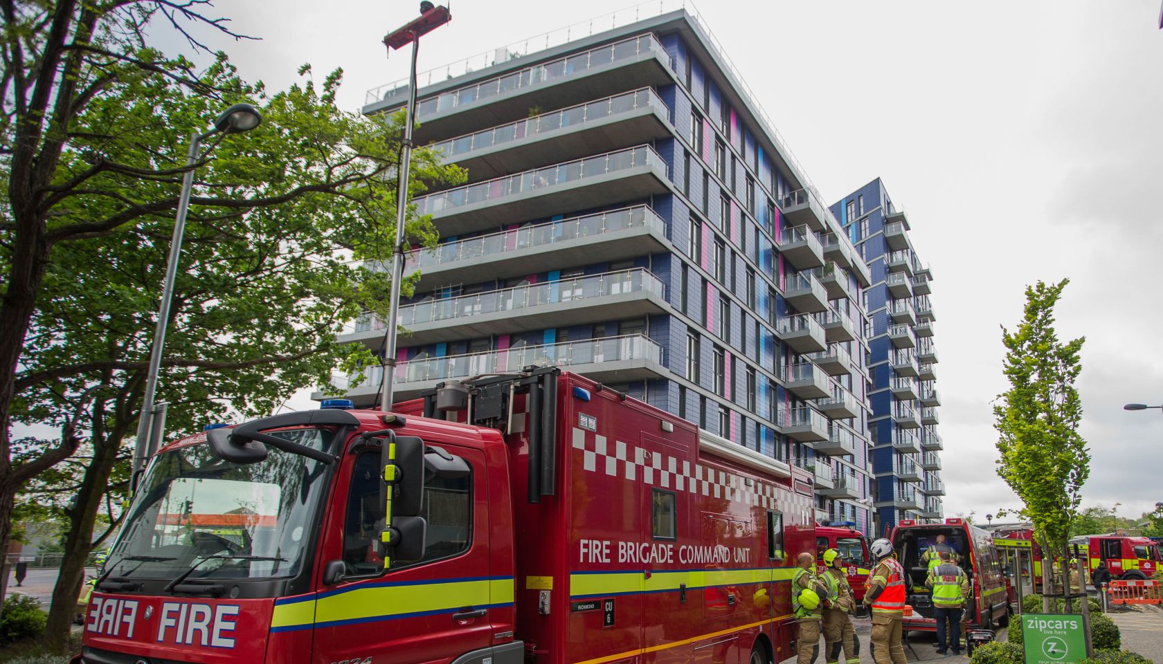 Eight fire engines and around 60 firefighters attend to a fire in a block of flats on Hatton Road, Alperton.