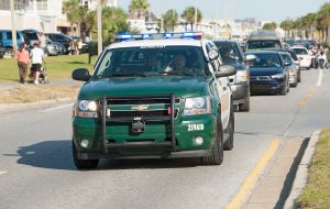 Sergeants car of the Sheriffs Department driving on a blue light Florida USA