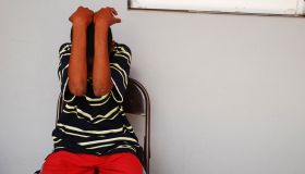 Dominica, Roseau, Juveniles Prison social center, teenager hiding his face