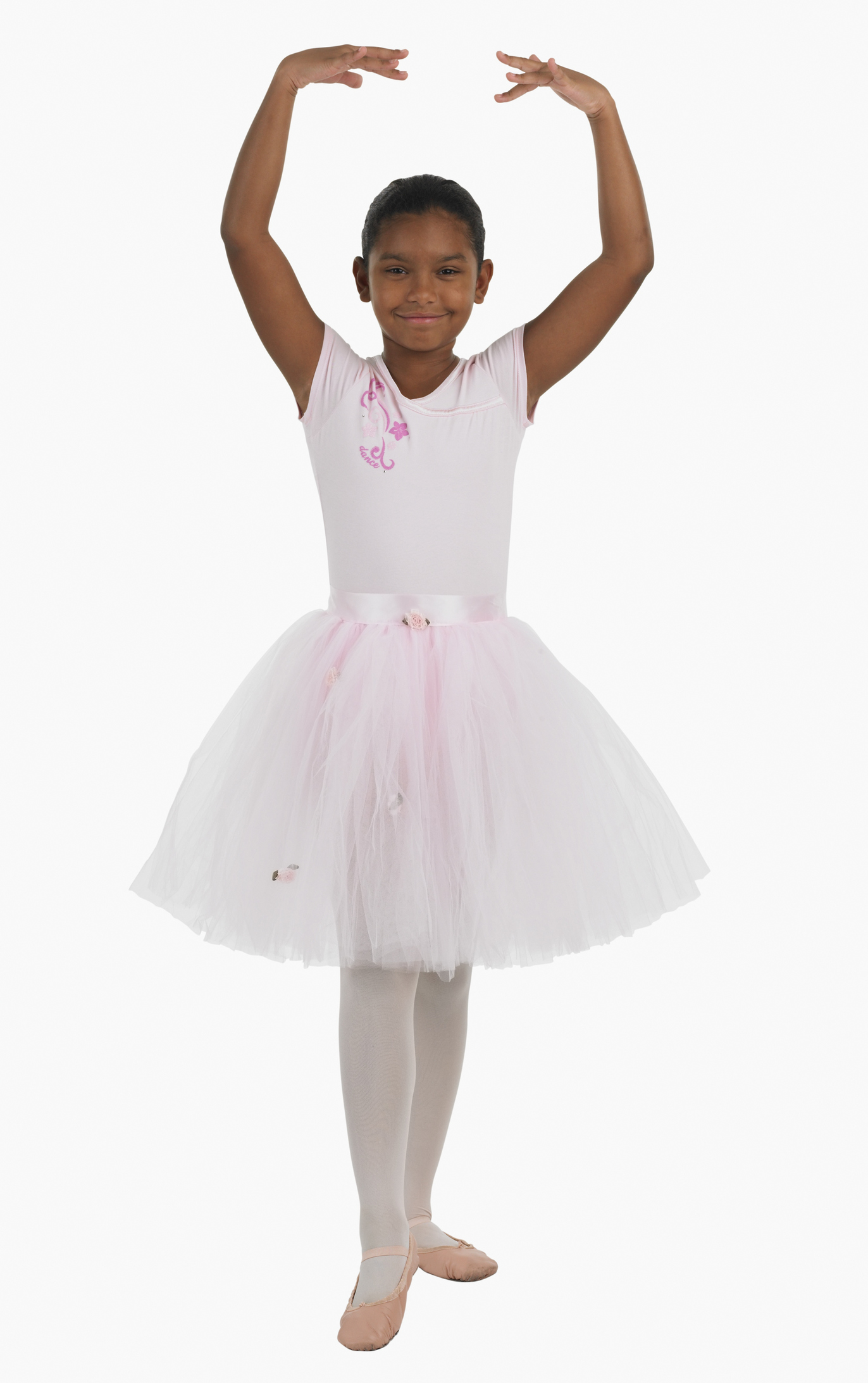 Studio shot of girl practicing ballet