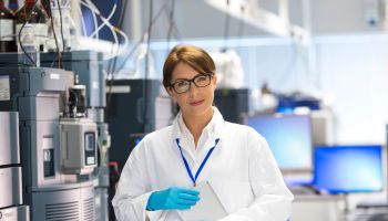 Professionals Female in Lab with Specialist Scientific Equipment