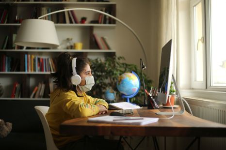 Schoolgirl watching online education class