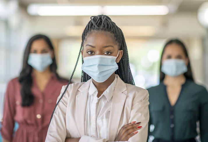 The business women wearing masks