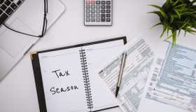 Tax Season. Tax Financial Planning. Form 1040 on Working Desk.