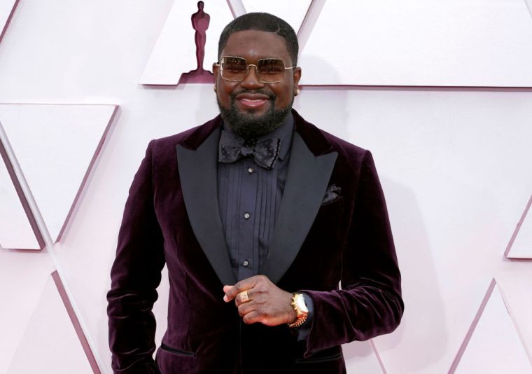 Lil Real Howery in Zegna