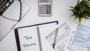 Tax Season. Tax Financial Planning. Form 1040 on Working Desk.