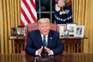 Reportage: President Donald Trump addresses the nation from the Oval Office of the White House Wednesday evening March 11 2020 on the country's expanded response against the global Coronavirus outbreak.