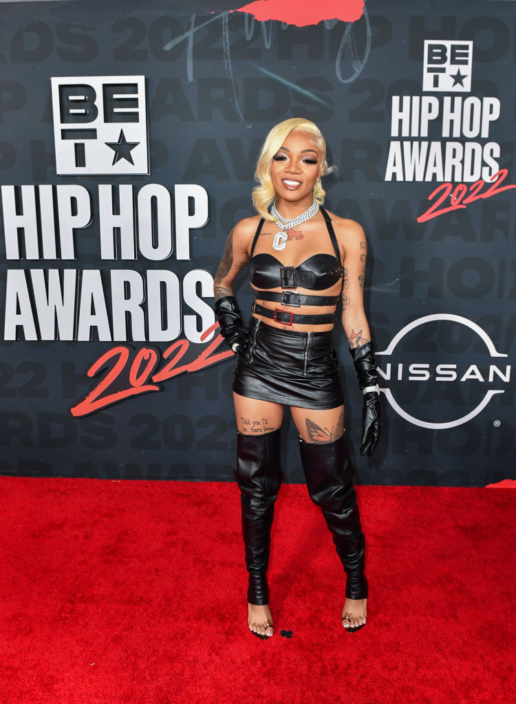 Glorilla in a black leather outfit designer unknown