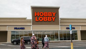 Shoppers are seen in front of a Hobby Lobby arts and crafts...