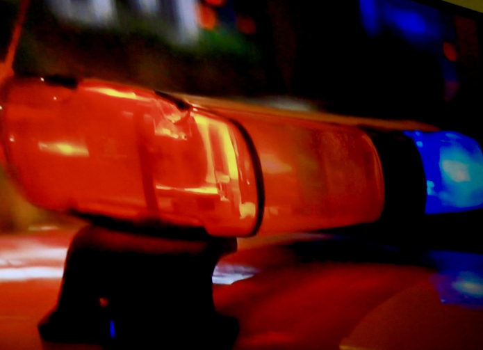 Flashing lights on police car - crime concept