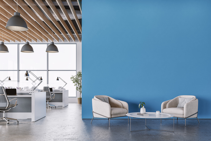 Modern Office Interior with azure blue wall and Minimalist Lounge Area