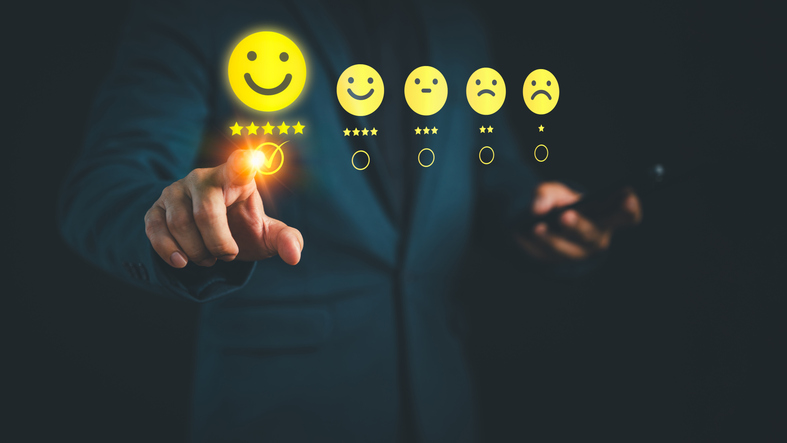 Customer Satisfaction Survey concept showing a 5 star rating system through an online application, customers evaluate product and service quality and share feedback reviews, high satisfaction levels.